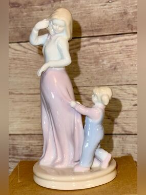 RUSS - Marbella Porcelain Child Pulling on Mothers Dress Figurine - NEW